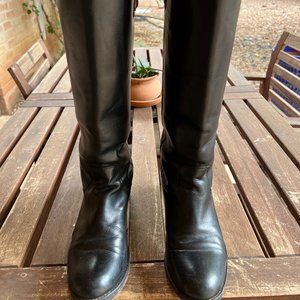 Glossy black Frye Melissa button tall leather boots